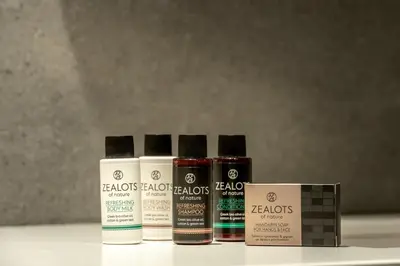 four bottles of hair products sitting on a counter at Zakro Luxury Living Chania in Chania Town