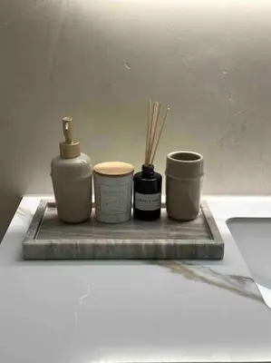 a tray with three mortar and pestles on a table at Linear Flat - City Center - Private Parking in Chania Town