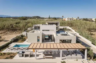 an aerial view of a house on the beach at Villa Iocaste - With private pool and EV station in Chania Town