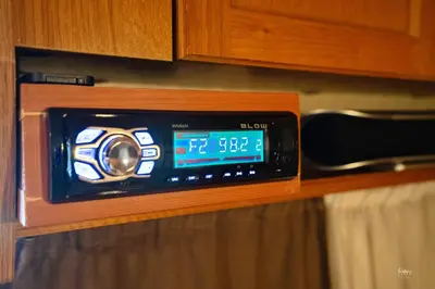 a digital clock on a kitchen counter at Lemon Garden Camper in Chania Town