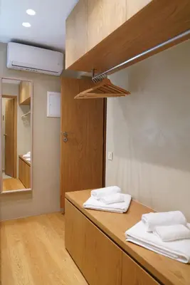 a kitchen with two towels on a counter with a mirror at Mystiko Maisonette with Hot Tub - Chania Old Town in Chania Town