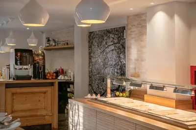 a kitchen with a counter and a counter top at Elia Daliani in Chania Town