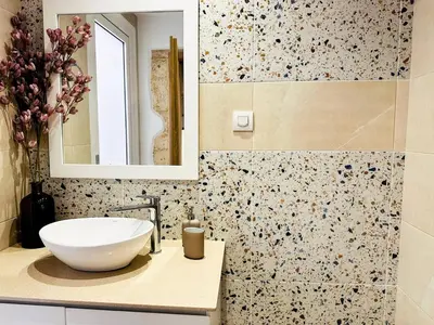 a bathroom with a sink and a mirror at Roussos Place - Next To Splantzia Square - 2bd 2ba in Chania Town