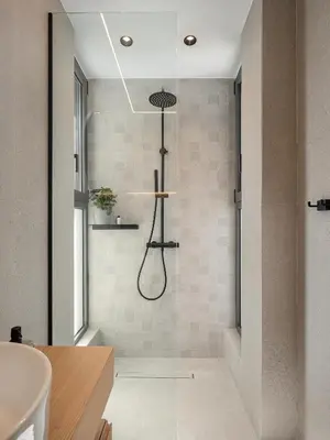 a bathroom with a shower with a glass door at Villa Levante With Sea View in Plataniás