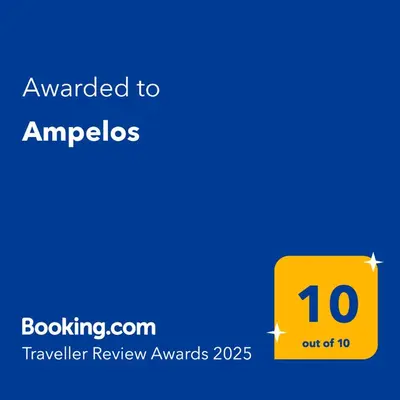 a yellow sign with the words awarded to amroos on a blue at Ampelos in Perivólia
