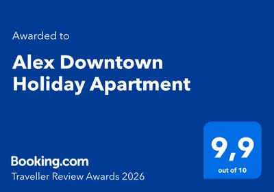 a blue sign with the words ashown holiday appointment at Alex Downtown Holiday Apartment in Chania Town