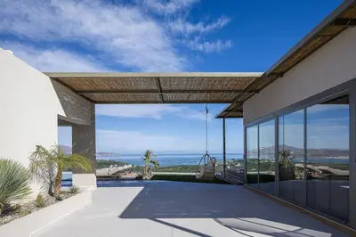 a house with a view of the ocean at Virtus in Mare in Tsivarás