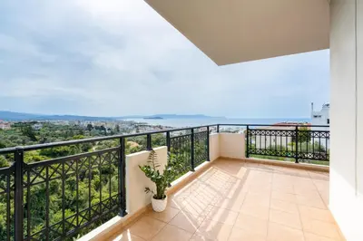 a balcony with a view of the city at Aelia Sea View in Chania Town
