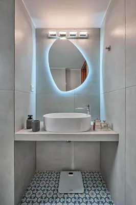 a bathroom with a sink and a mirror at Mons Villa in Kalathas