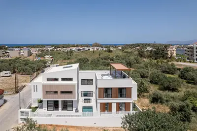 an aerial view of a white house at P Project Houses in Aghii Apostoli