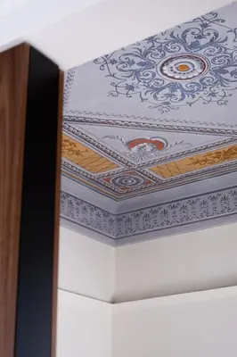 a ceiling with a painting on it at Bouquet Luxury Rooms in Chania Town