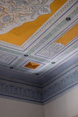 a ceiling with a painting on it at Bouquet Luxury Rooms in Chania Town