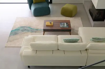a living room with a white couch and a coffee table at Blue Zone Villa, a SeaView Sanctuary with Pool, By ThinkVilla in Chania Town