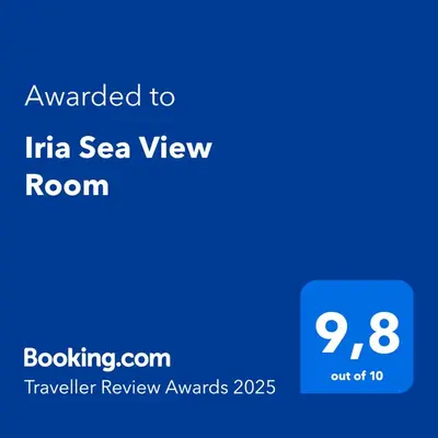 a screenshot of a phone with the text awarded to irina sea view room at Iria Sea View Room in Kolymvari