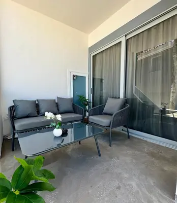a living room with a couch and a coffee table at mare suites 4 in Chania Town