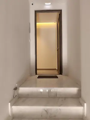 an empty corridor with a door in a room at Sandy Suite 3 in Agia Marina Nea Kydonias