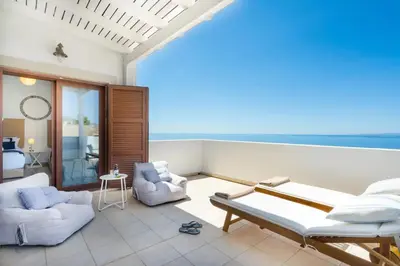 a living room with a view of the ocean at Villa Alia in Sfakiá