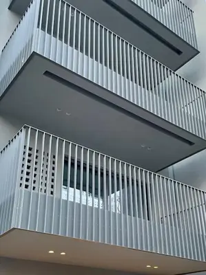 a building with white stairs in a building at Hermes Studio - In the city just steps to the sea! in Chania Town