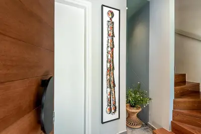 a hallway with a framed picture on the wall at Amarillide rooms in Chania Town