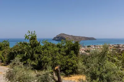 a view of a town and the ocean at Delta Sea View House in Plataniás