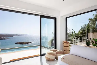 a living room with a view of the ocean at Casablanca Villa in Chania Town