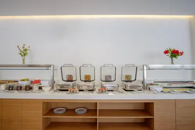 a counter with a bunch of mirrors on it at Phos Hotel Adults Only in Plataniás