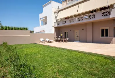 a view of the backyard of a house at Cozy Rena luxury apartment with free private parking in Chania Town