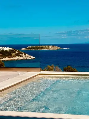 a swimming pool with a view of the ocean at Yemaya Sea View Villa in Chania Town