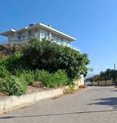 a house on the side of a road at UPapartment in Chania Town