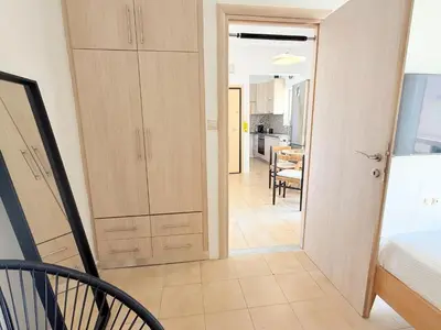 a hallway with a door leading to a bedroom at Yia Banaki 1 Min Walk To Beach old Town 7min Walk in Chania Town