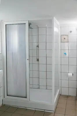 a shower with a glass door in a bathroom at Be Crete - Villa Erofili in Chania Town
