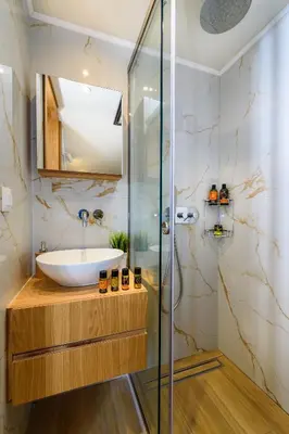 a bathroom with a sink and a shower at Nicolas Urban Luxury Living in Souda