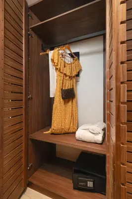 a dress is on a shelf in a closet at Elia Sea Suites in Chania Town