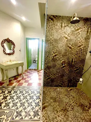 a bathroom with a shower and a sink at La Sistina in Chania Town