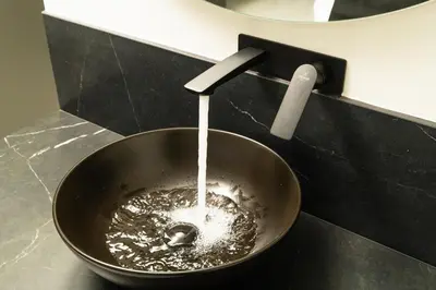 a kitchen sink with water pouring into a bowl at Paradise Hill Luxury Villa in Kalyves