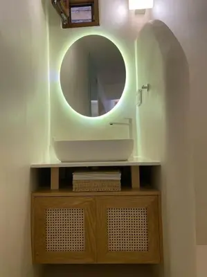 a bathroom with a sink and a mirror at Teviot, 