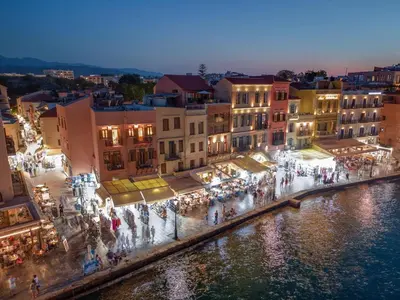 a view of a city with a river and buildings at Leo Apartment 2 bdr apt overlooking the harbor in Chania Town