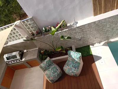 an overhead view of two vases sitting on a deck at Luxious Holiday Apt in Chania Town