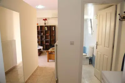 a hallway with a door leading to a room at THE VERANDA OF CHANIA in Chania Town