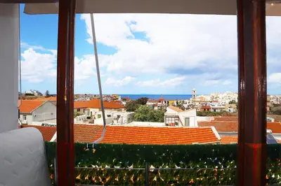 a view of a city from a window of a building at Studio92 Chania in Chania Town