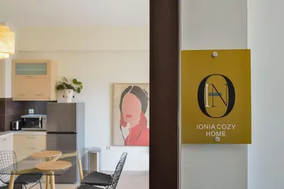 a door with a sign that says home cozy have at Ionia Cozy Home in Chania Town