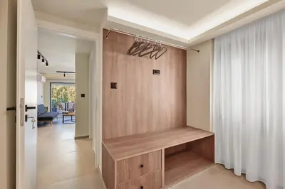 a home office with a built in book shelf at Callista Seafront Studio in Chania Town