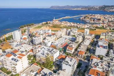 an aerial view of a city next to the water at Be Crete - White Pearl in Chania Town