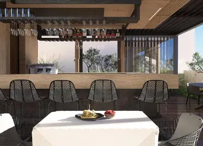 a table with a plate of food on a patio at Nearchou Boutique Hotel in Chania Town