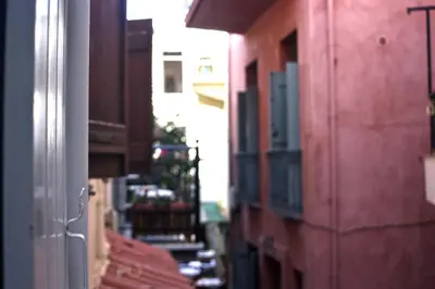 a view of an alley between two buildings at La Fiora Old Town Chania in Chania Town