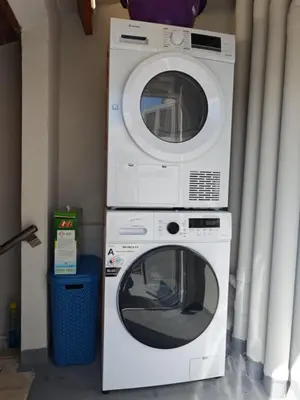 two machines are stacked on top of each other at Casa di Rosa in Chania Town