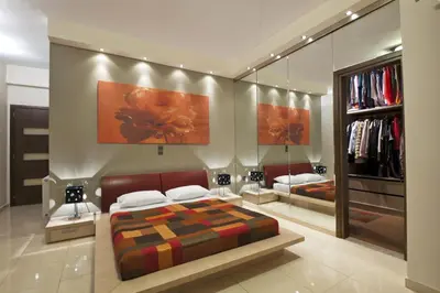 a bedroom with a bed and a large mirror at Modern Interior Villa in Chania Town