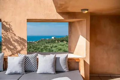 a view of the ocean from a room with a window at Villa AnnaNiko, Luxury Villa, 2 Heated Pools, Jacuzzi, Gym, Stunning Views, Green Energy in Gerani Chanion