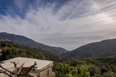 a building with a view of the mountains at Elirion Luxury Home II in Kamária
