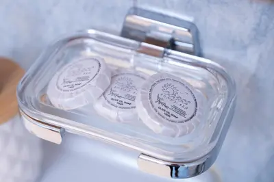 a plastic container with three round objects in it at Haris home in Daratso